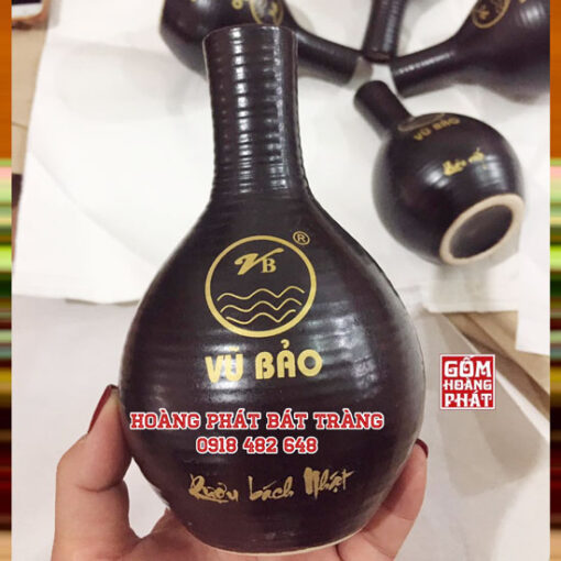 nam ruou gom su bat trang vu bao