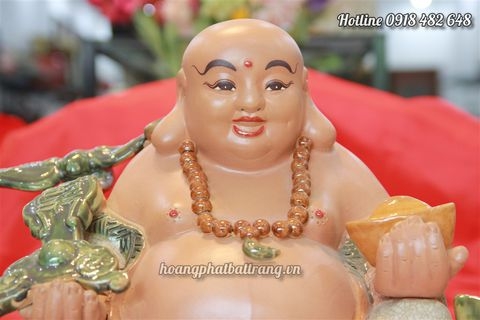 Tượng Di Lặc cưỡi cá chép hóa rồng dáng ngồi