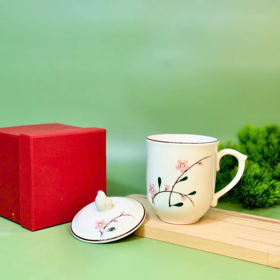 cốc in ấn logo hoa đào đỏ men kem