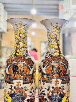 Lục bình sứ Phúc Đức men rạn đắp nổi hoa mai vàng