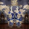 Lục bình sứ hoa sen men lam khử vẽ vàng 24k